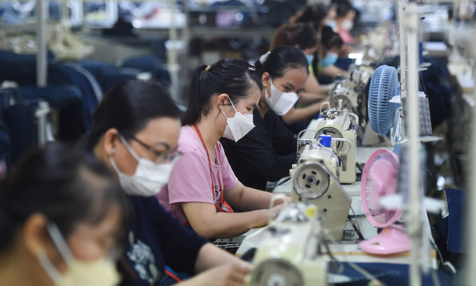 Рабочие текстильного предприятия в Хошимине, ноябрь 2023 года. Фото: VnExpress  
